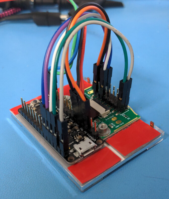 the Metro mounted directly to the back of the LCD, alongside the LCD’s interface board. Connected to each other using jumper wires