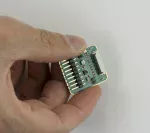 ePaper adapter in-hand to show perspective.