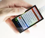 240x400 3 EVE powered capacitive touch screen TFT Display module. Front view, in hand to show size and perspective.