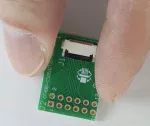 12-position ZIF breakout board. In hand to show size and perspective.