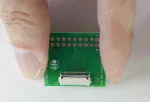 20-position ZIF breakout board. In hand to show size and perspective.