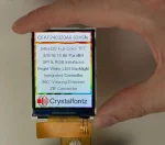 320x240 full-color TFT in hand to show size and perspective.