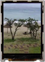 Beach photo, modified to appear as the eye perceives the image on the display.
