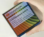 480x480 4 TFT LCD Module, in-hand to show the size and perspective, powered on.