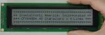 40x4 Character LCD, Dark lettering on a light gray background. In hand to show size and perspective.