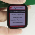 368x448 high density 1.93-inch full-color graphic OLED display module with capacitive touchscreen. Front view, in   hand to show size and perspective.
