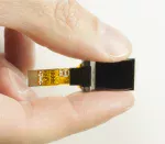 Small 48x64 pixel OLED display - In hand for perspective