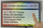 1280x800 10.1 inch IPS TFT Display Module. Full color with resistive touch screen and HDMI interface.
Front view, powered on, with hand to show size and perspective.