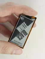 104x212 flexible ePaper display.in hand to show size and perspective.