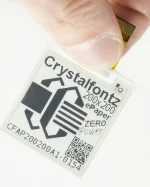 1.54 inch square e-paper, black and white. In hand for perspective.