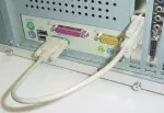 This shows the bracket end of the WR232Y13 in the
PC expansion slot (with the ribbon cable inside), and the WR232Y10 13 cable
connecting the WR232Y13 bracket end with the serial port.