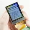 240x320 Full-Color TFT Display, front view, in-hand to show size and perspective.