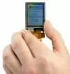 240x320 2-inch TFT Display, front view, in hand to show size and perspective.