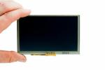800x480 5 Resistive Touchscreen TFT Display. In hand to show size and perspective. 800x480 5 Resistive Touchscreen TFT Display. In hand to show size and perspective.