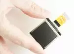 128x128 Graphic OLED display module - In hand for perspective
