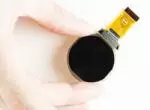 128x128 Round OLED display - in hand for perspective