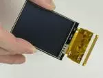 240x320 2.4 inch TFT LCD pictured in hand for perspective