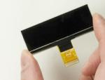 128x32 small oled display, front, in hand. 128x32 small oled display, front, in hand.