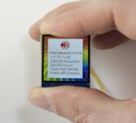 240x240 Color TFT Display 1.3 inch, in hand, to show size and perspective.