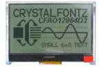 The CFAO12864D3-TFH is a 128x64 dark on light gray LCD display  – front view, backlight off, tail folded. The CFAO12864D3-TFH is a 128x64 dark on light gray LCD display  – front view, backlight off, tail folded.