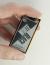 104x212 flexible ePaper display.in hand to show size and perspective.