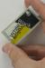 2.13 inch 3-color ePaper display module with SPI interface. In-hand to show perspective.