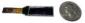 The CFAL12832D-BY is a 0.91 inch 128x32 yellow-on-black graphic OLED - front view, power off. Size compared to an American 25 cent piece.