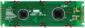 The CFAH1602O-YYH-ET is a dark on yellow-green character LCD display module ‒ back view.