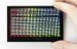 480x272 4.3-inch, TFT LCD Display module, front view, in hand to show size and perspective.