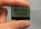 128x64 Small Transflective LCD with carrier board. Front view, in hand to show size and perspective.