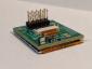 240x240 1.3 inch TFT Display with adapter board. Angle view, to show size and perspective.
