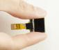 Small 64x48 OLED Display in hand for scale