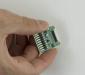 ePaper adapter in-hand to show perspective.