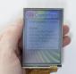 320x480 Resistive touchscreen TFT display. In hand to show size and perspective
