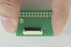 24-position ZIF breakout board.  In hand to show size and perspective.