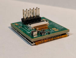 240x240 1.3 inch TFT Display with adapter board. Angle view, to show size and perspective.