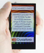 240x400 Pixel, Full color TFT display. Front view, powered on.In hand to show size and perspective.