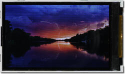 Unmodified, appears as the camera perceives the display