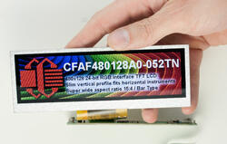 5.2-inch, bar type, TFT lcd. In hand to show perspective and size.