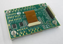 The CFAO12864D3-TMI-CB is a carrier board kit with a 128x64 CFAO12864D3-TMI graphic LCD display – perspective back view, showing the CFA-10072 carrier board.