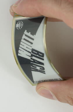 Flexible ePaper display, in hand for perspective.