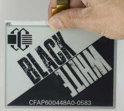 5.83 inch epaper display module in black and white. In hand to show perspective.