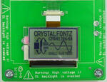 The CFAX12864AP1-WFH mounted on the cfaxzifdemo demonstration board (backlight off).