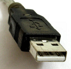 This is an end fiew of the USB connector. It will mate with the standard USB connectors found on PCs.